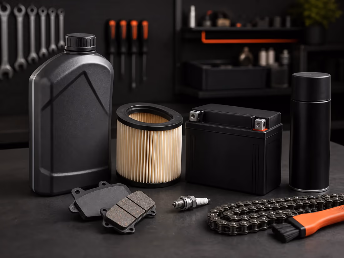 Motorcycle service products and replacement parts on a workbench